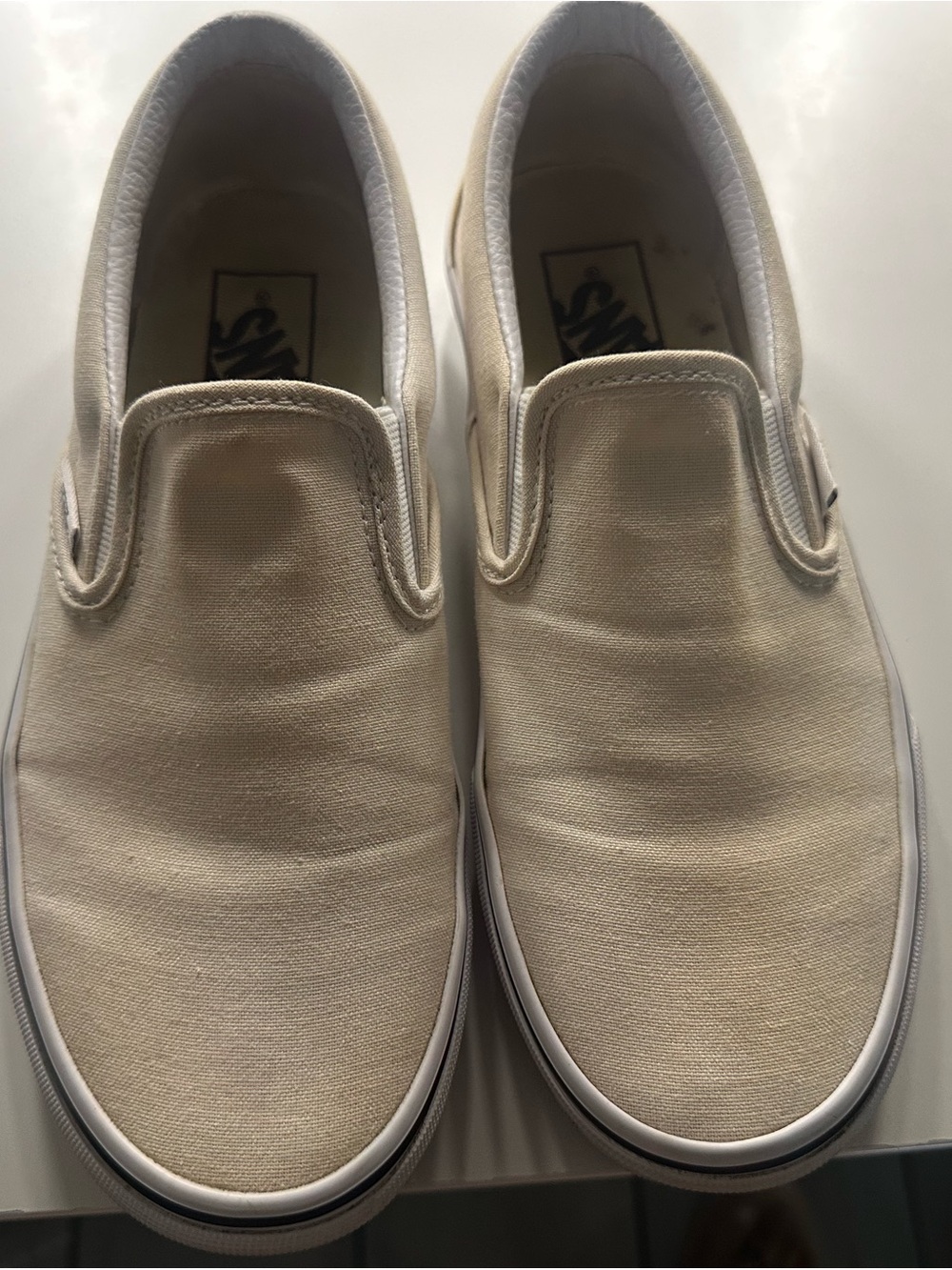 Vans Slip-On Canvas Sneakers in Cream